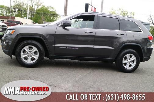 Photo 2 of 31 of 2015 Jeep Grand Cherokee Altitude