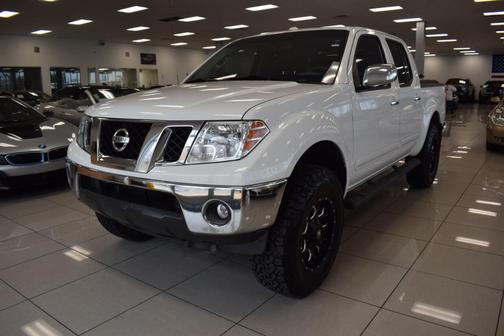 Photo 4 of 56 of 2013 Nissan Frontier SL