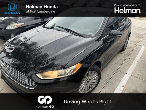 Photo 1 of 11 of 2013 Ford Fusion Hybrid SE