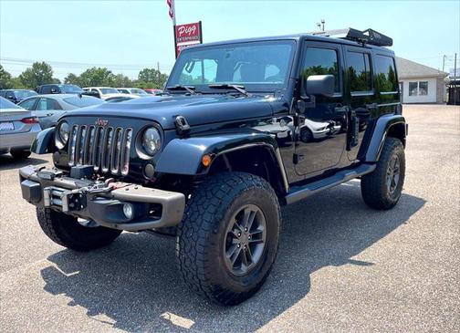 Photo 4 of 42 of 2016 Jeep Wrangler Unlimited Sahara
