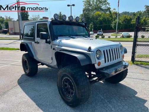 Photo 1 of 50 of 2010 Jeep Wrangler Sport