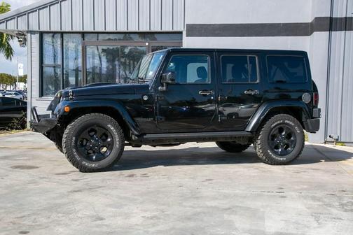 Photo 5 of 34 of 2015 Jeep Wrangler Unlimited Altitude