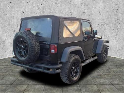 Photo 3 of 25 of 2017 Jeep Wrangler Sport