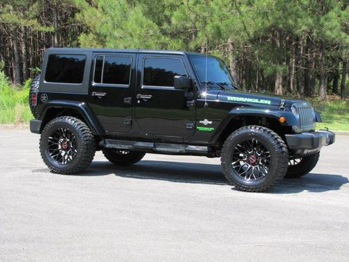 Photo 3 of 32 of 2015 Jeep Wrangler Unlimited Freedom Edition