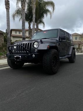 Photo 2 of 7 of 2014 Jeep Wrangler Unlimited Sahara