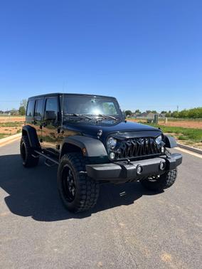 Photo 3 of 13 of 2016 Jeep Wrangler Unlimited Sport