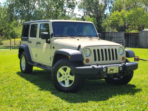 Photo 3 of 27 of 2011 Jeep Wrangler Unlimited Sport